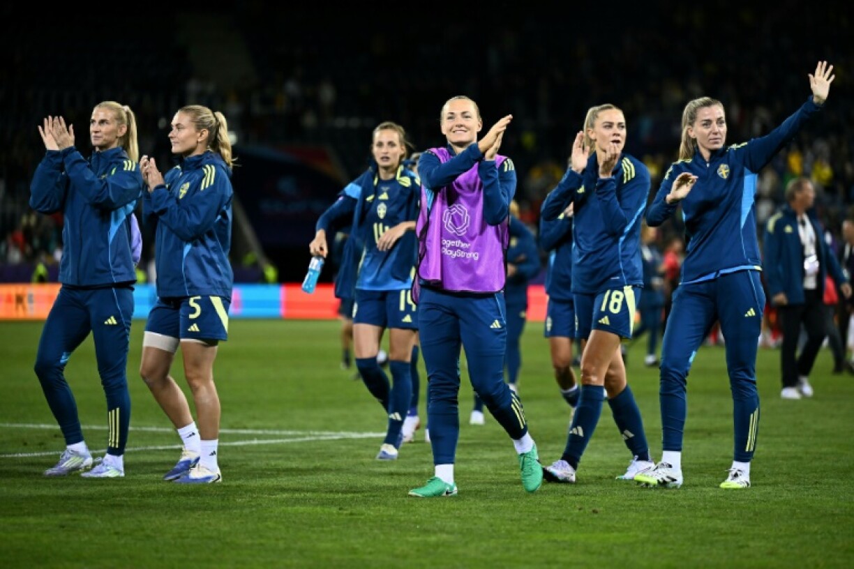 Sweden players acknowledge supporters after their 3-0 win over Women's Euros newcomers Poland