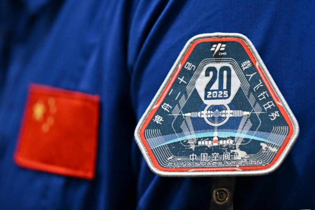 Three Chinese astronauts returned to Earth on Wednesday after six months on the country's space station