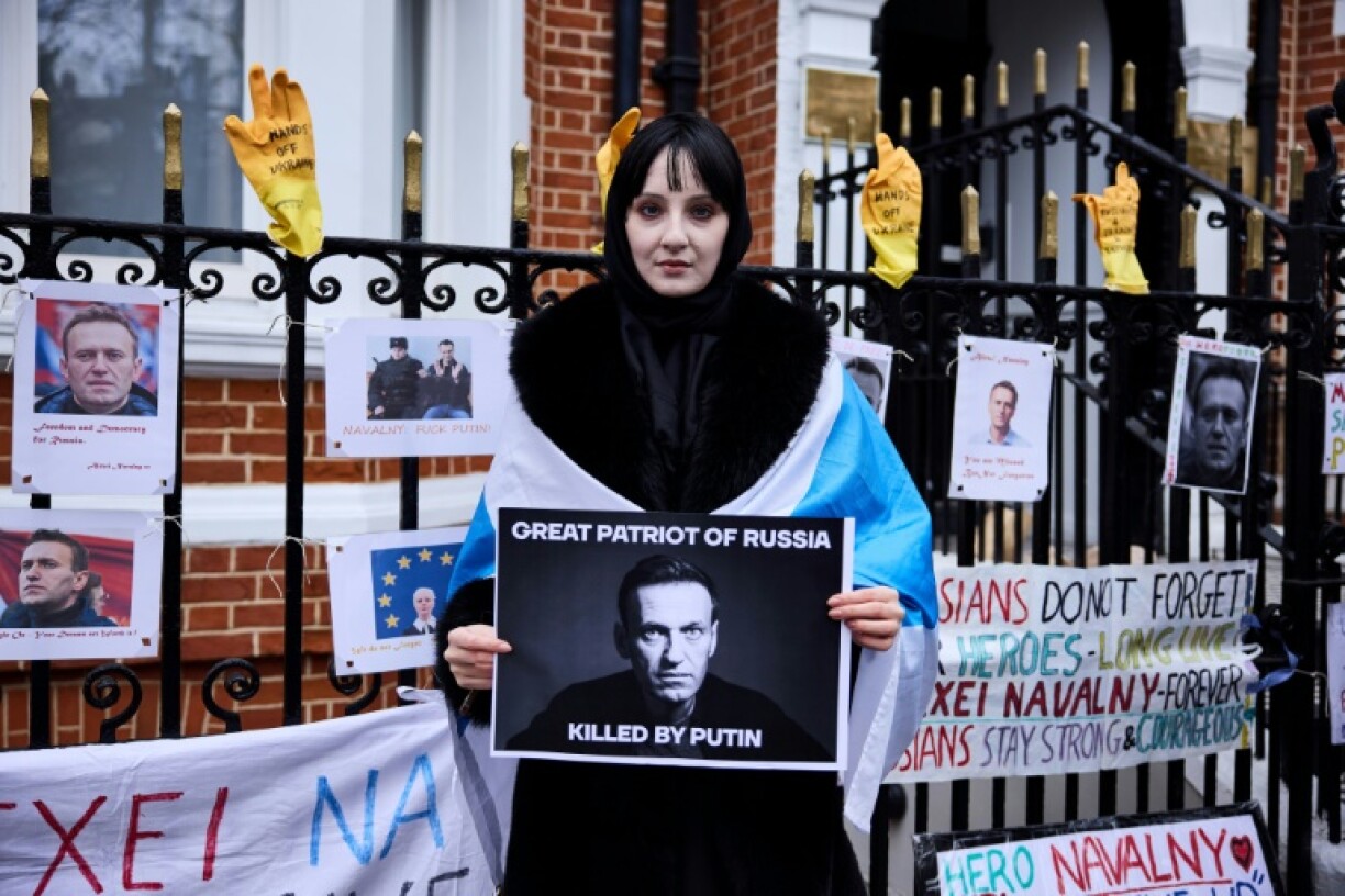 Protesters gathered outside the Russian Embassy in London