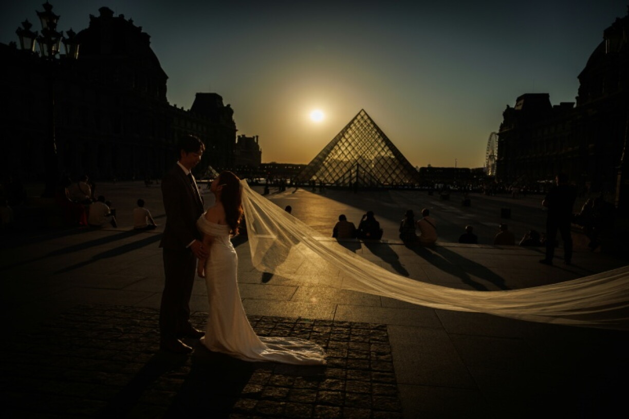 The glass Pyramide du Louvre was designed by Chinese-US architect Ieoh Ming Pei
