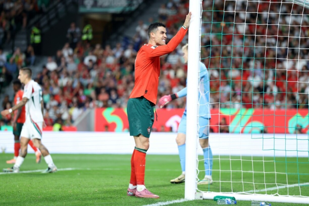 Portugal forward Cristiano Ronaldo struck twice but his team were held in a 2-2 draw against Hungary on Tuesday