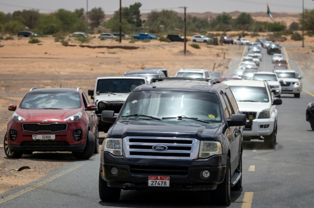 Indian-born UAE estate agent Muhammed Sajjad, leads a convoy of fIndian expats nostalgic for the monsoon season, on a