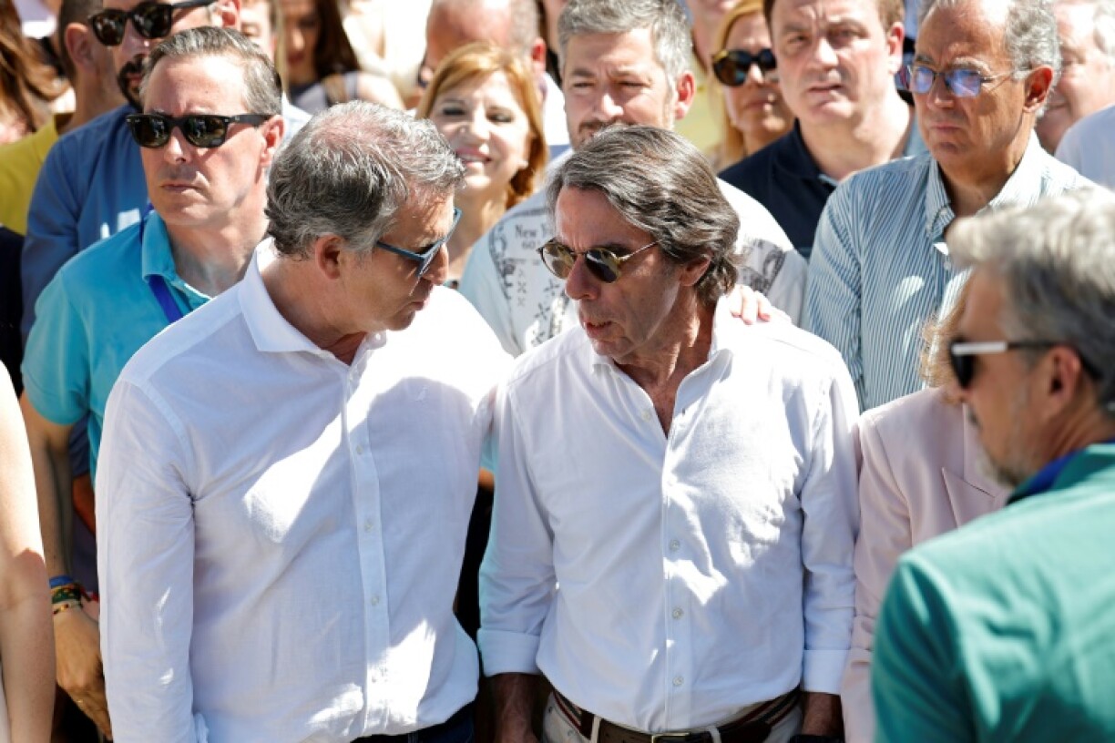 Spain's former prime minister Jose Maria Aznar appeared alongside the current head of the PP, Alberto Nunez Feijoo, at the rally
