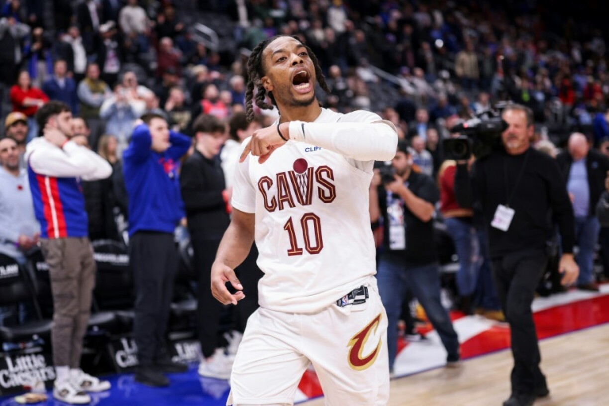 Darius Garland of the Cleveland Cavaliers reacts after making a buzzer-beating three-pointer to defeat the Detroit Pistons