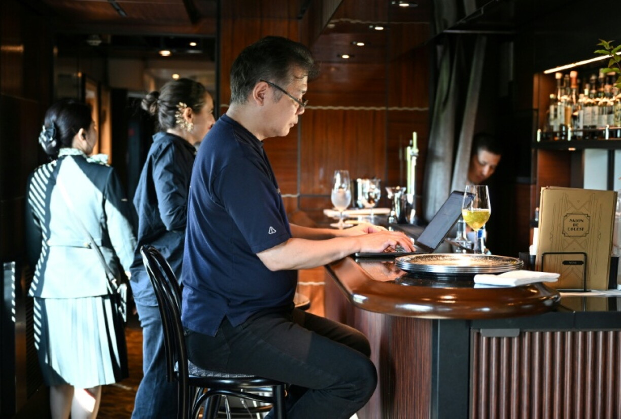 Toh EnJoe, a master of Japanese science-fiction, sipped a glass of wine as he wrote