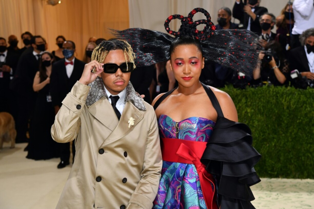 Japanese tennis player Naomi Osaka (R) says she and rapper boyfriend Cordae (L) have split up