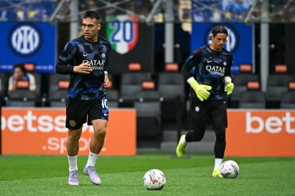 Lautaro Martinez (L) is a major injury doubt ahead of Inter Milan's semi-final second leg clash against Barcelona in the Champions League