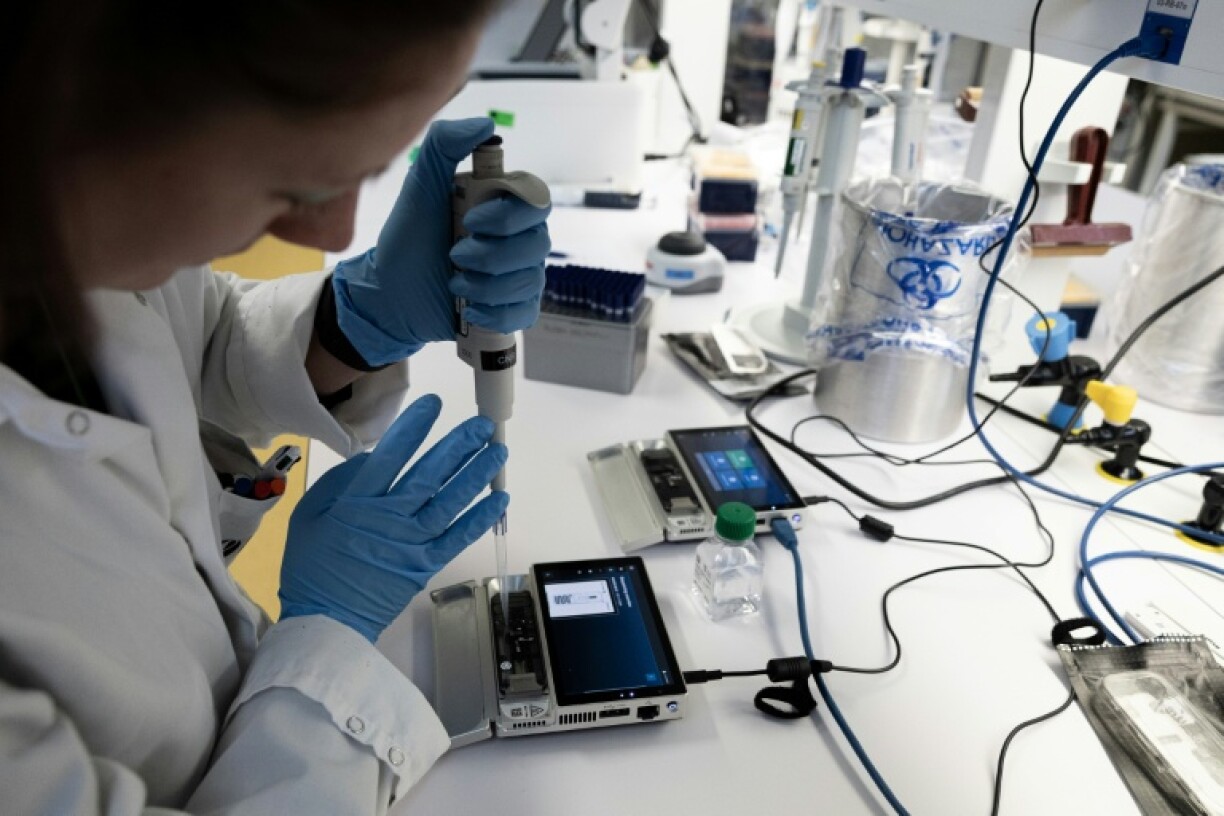 An engineer works on a sample at the Pasteur institute's biological emergency response cell in April 2024