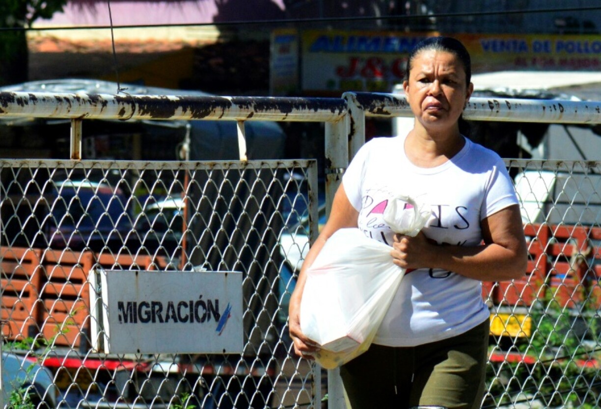 A woman crosses the Simon Bolivar international bridge on the Colombia-Venezuela border in Cucuta, Colombia on January 7, 2025.