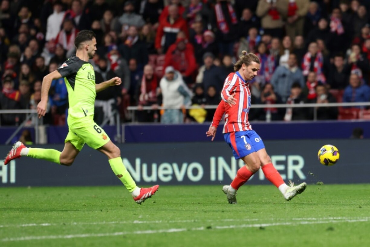 Atletico Madrid's French forward Antoine Griezmann finished with a fine chip to seal his team's win over Mallorca