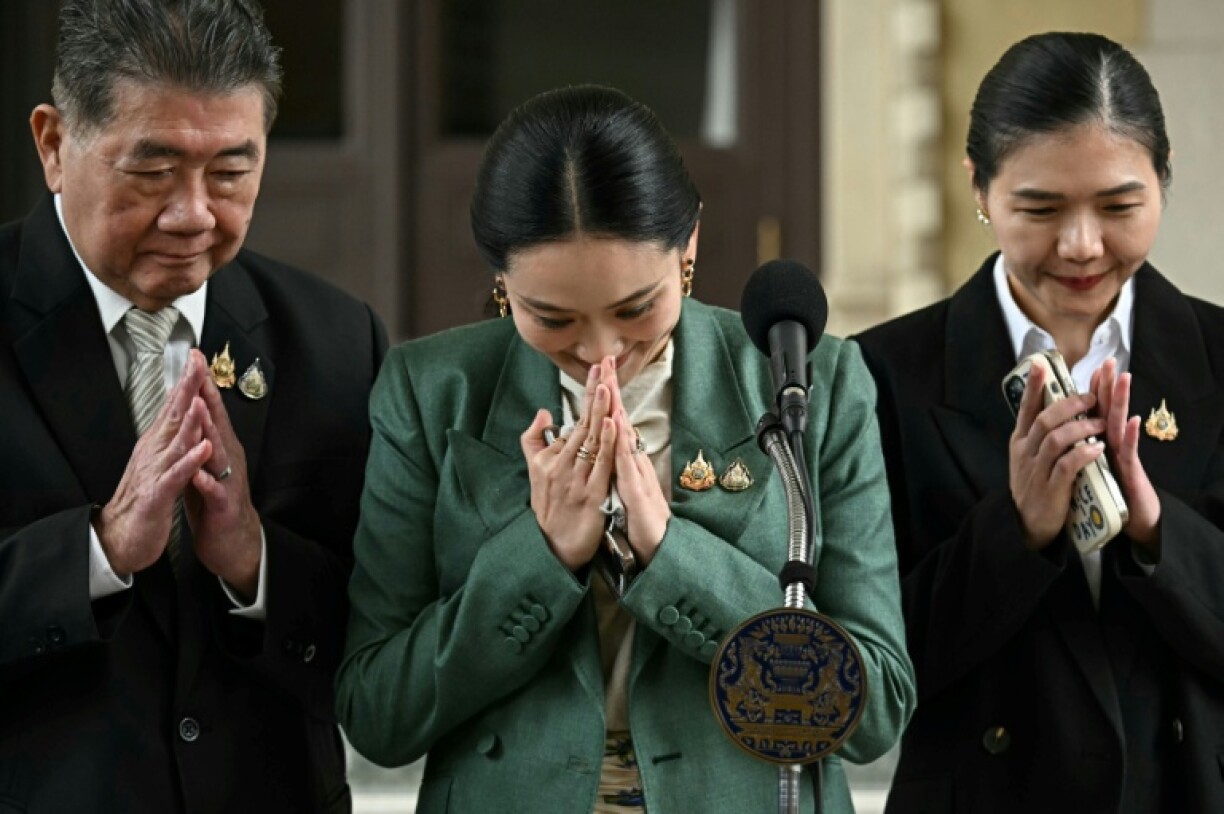 Phumtham Wechayachai takes over as acting prime minister after Paetongtarn Shinawatra (C) was suspended from her role