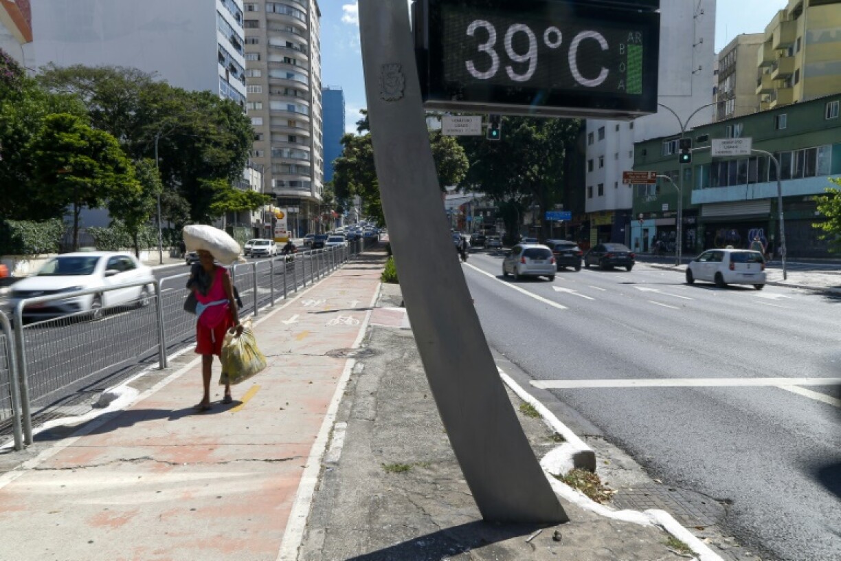 A thermometer shows a temperature of 39 degrees Celsius (102.2 F) in Sao Paulo, Brazil on March 17, 2024
