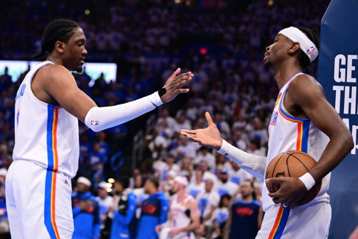 Shai Gilgeous-Alexander (right) celebrates with team-mate Jalen Williams in the Oklahoma City Thunder's win over Denver