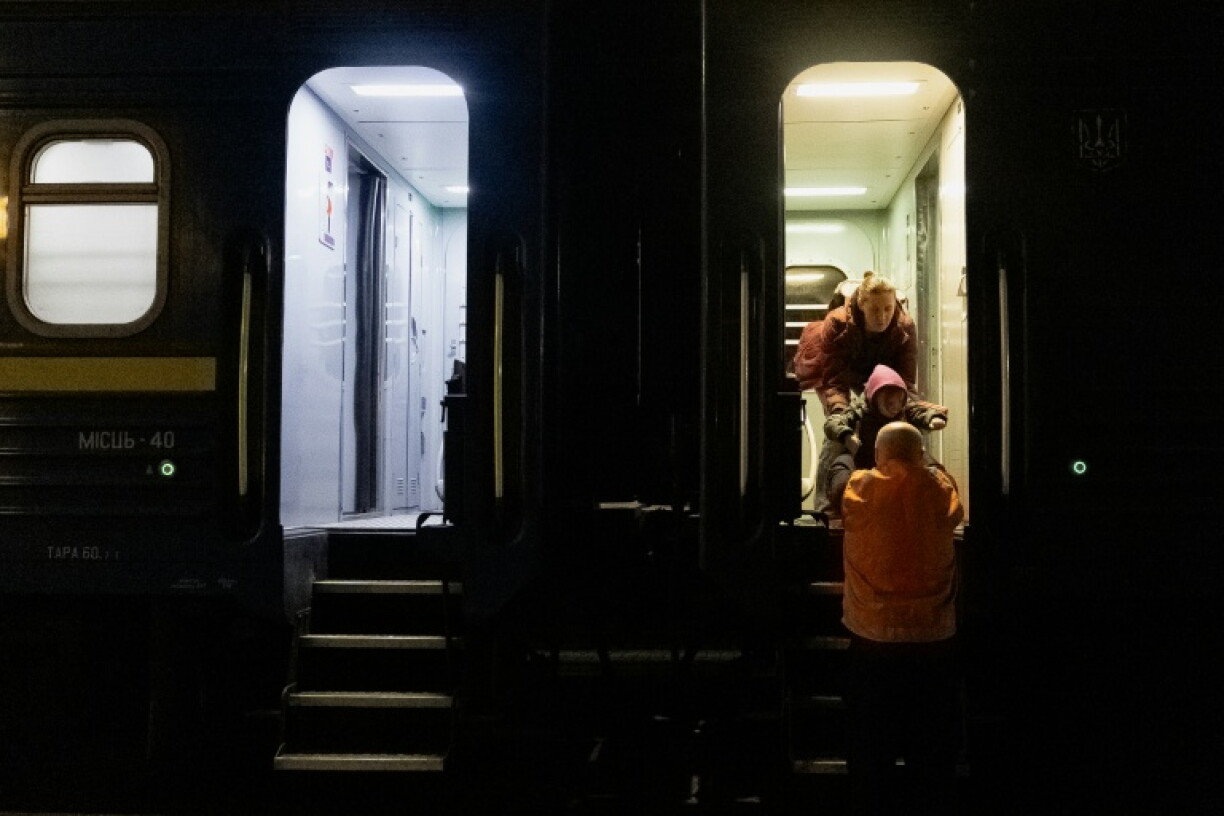 Minutes after an explosion, passengers began returning to the train