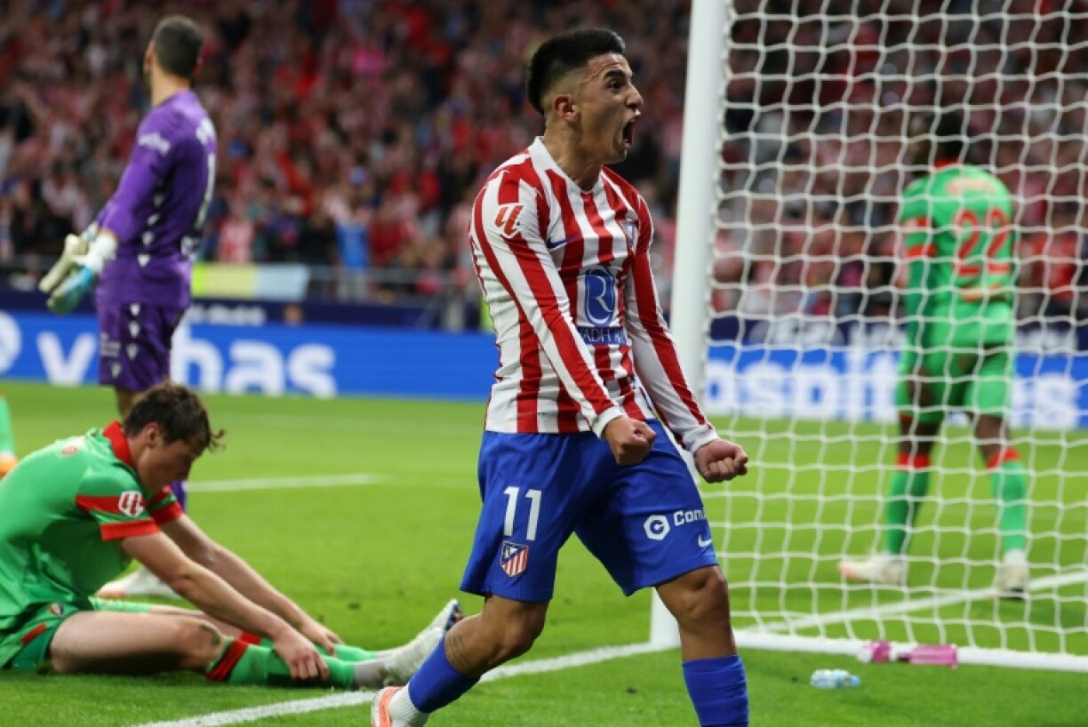 Atletico Madrid's Argentine midfielder Thiago Almada celebrates scoring the opening goal against Osasuna