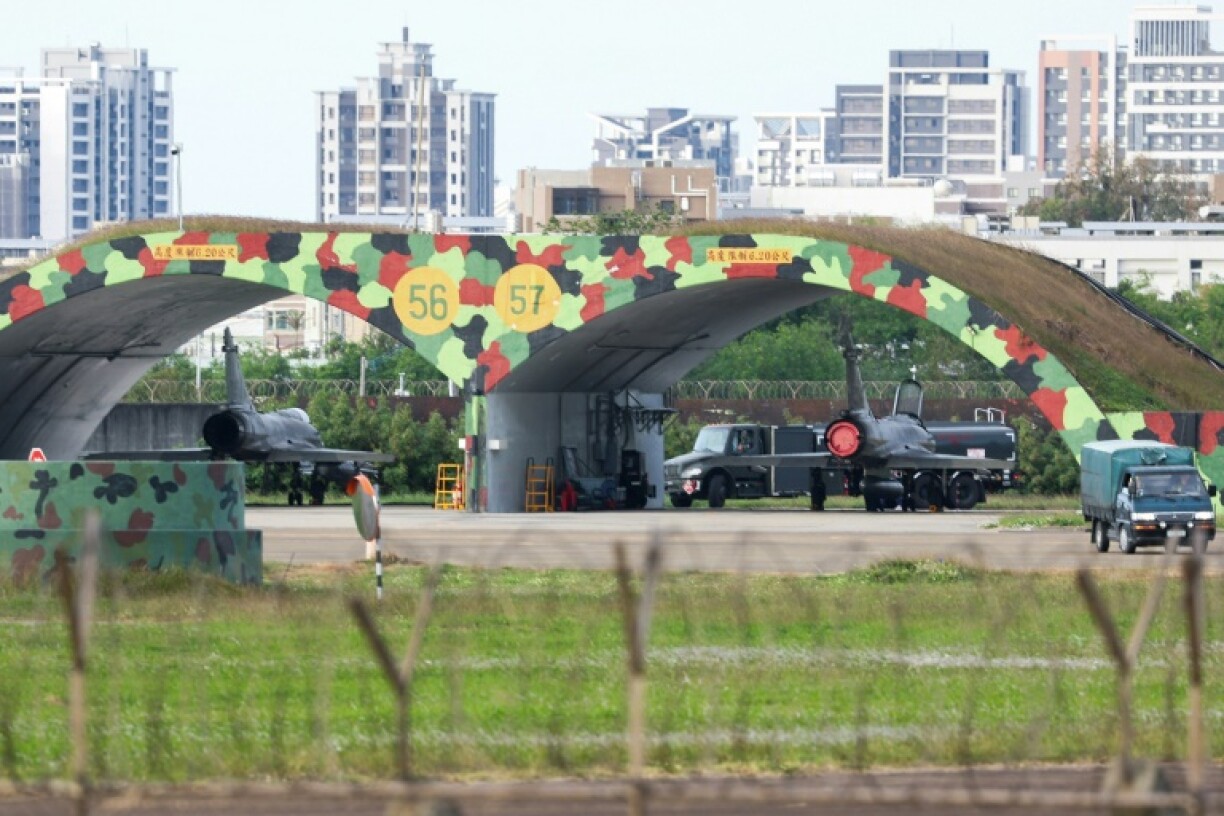 Taiwanese air force Mirage 2000 fighter jets are seen under hardened aircraft shelters at an air force base in Hsinchu