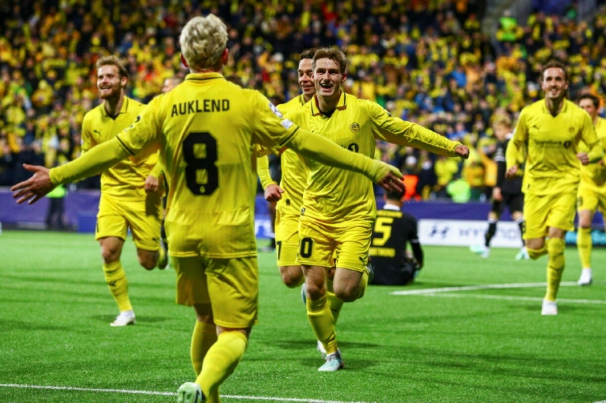 Fredrik Sjovold (C) celebrates scoring Bodo-Glimt's goal against Dortmund in the Champions League