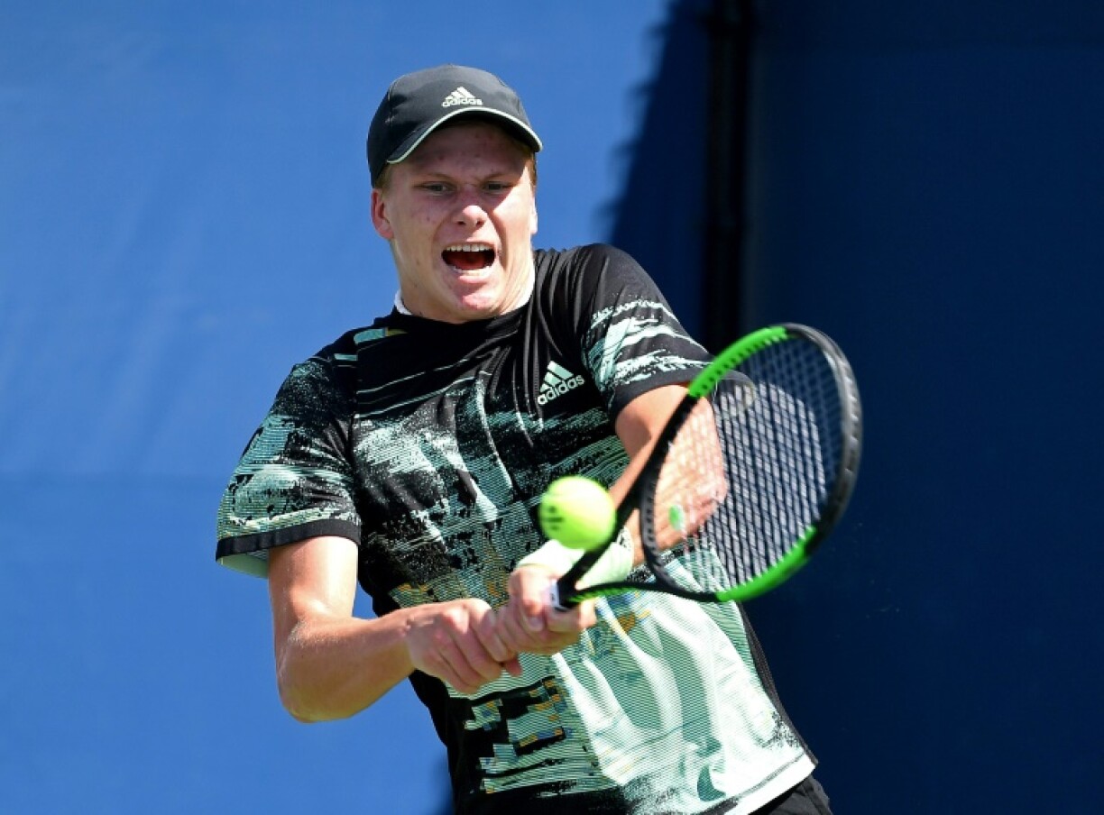 Qualifier Jenson Brooksby upset fellow American Francis Tiafoe to win the US Men's Clay Court Championships in Houston on Sunday.