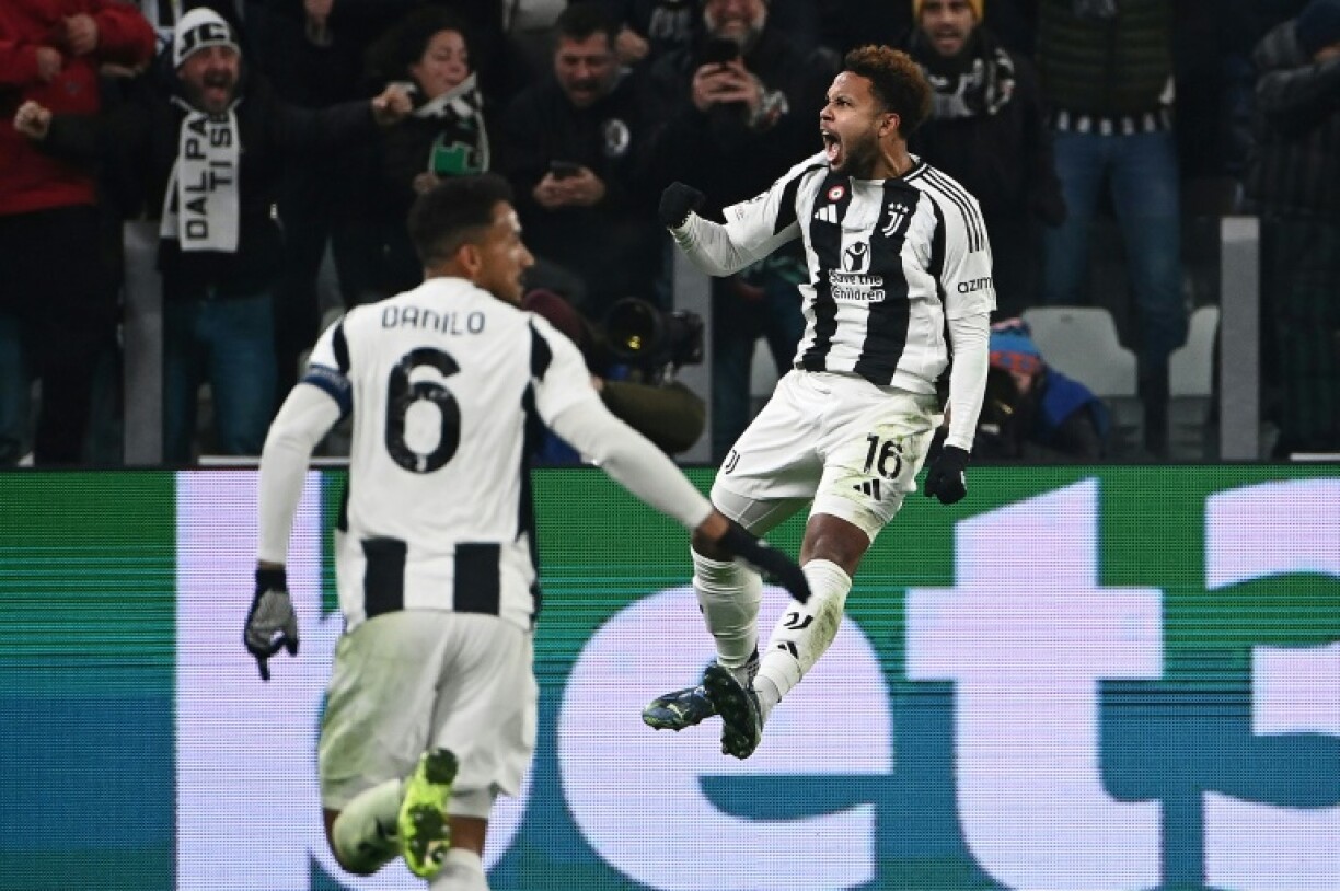 Weston McKennie (R) celebrates after scoring to give Juventus a 2-0 lead against Manchester City in Turin