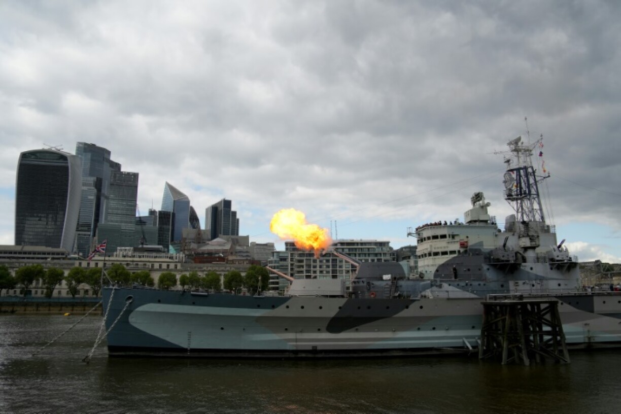 HMS Belfast -- one of the few surviving British warships from World War II -- fires off a gun salute