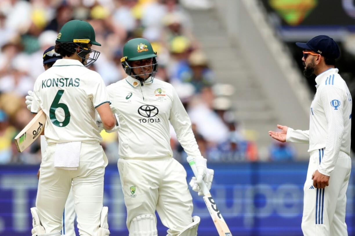 Australia's Sam Konstas (L) and India's Virat Kohli (R) bumped shoulders during the fourth Test in Melbourne