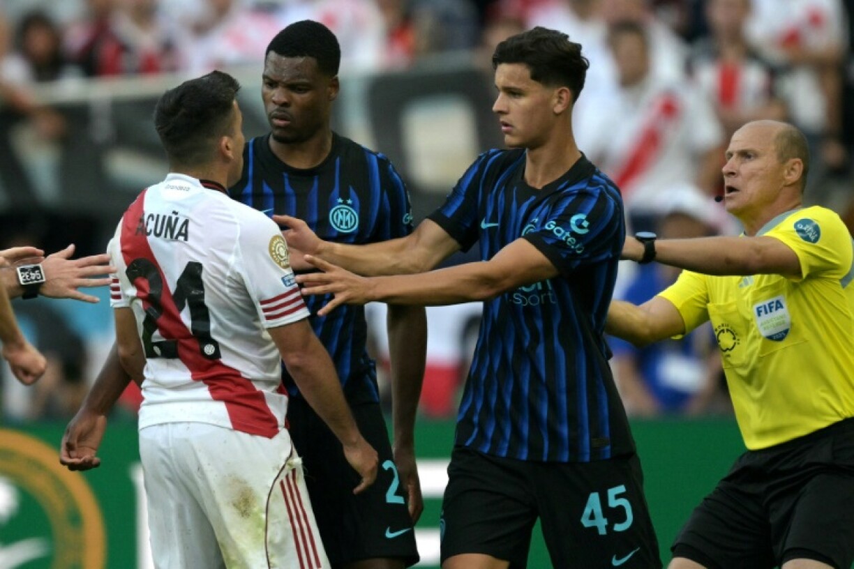 Tempers flare between Inter Milan and River Plater's players at the end of their stormy Club World Cup clash