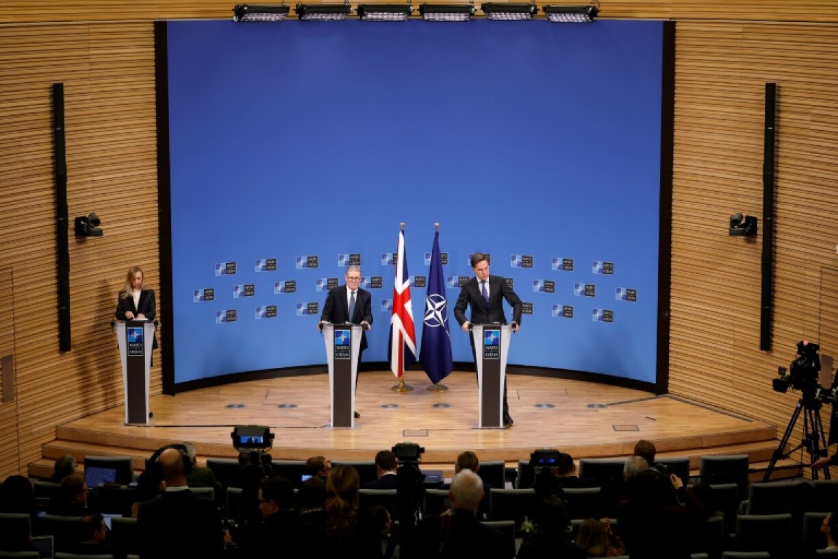 Britain's Prime Minister Keir Starmer (L) met NATO Secretary General Mark Rutte before a dinner with EU leaders