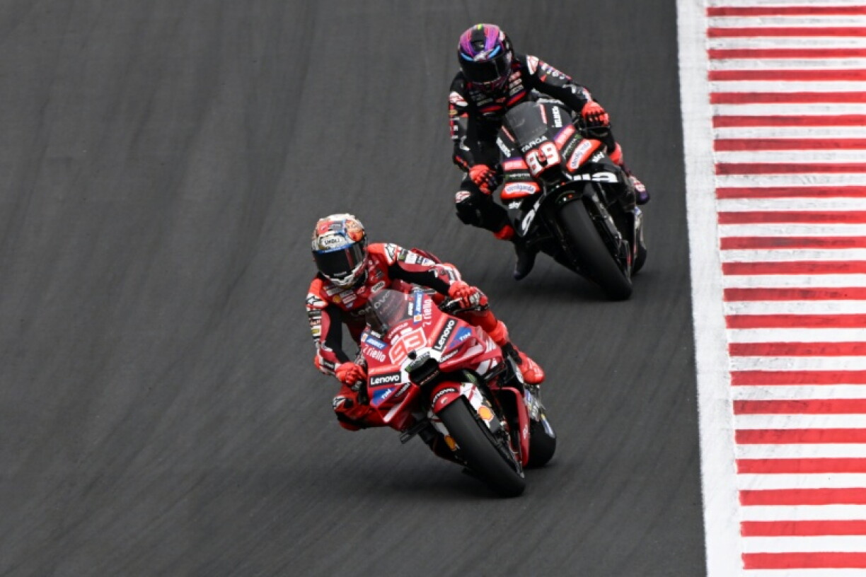 Ducati Lenovo Team rider Marc Marquez of Spain leads Aprilia Racing rider Jorge Martin of Spain during the MotoGP Japanese Grand Prix at the Mobility Resort Motegi in Motegi, Tochigi prefecture on October 4, 2026.