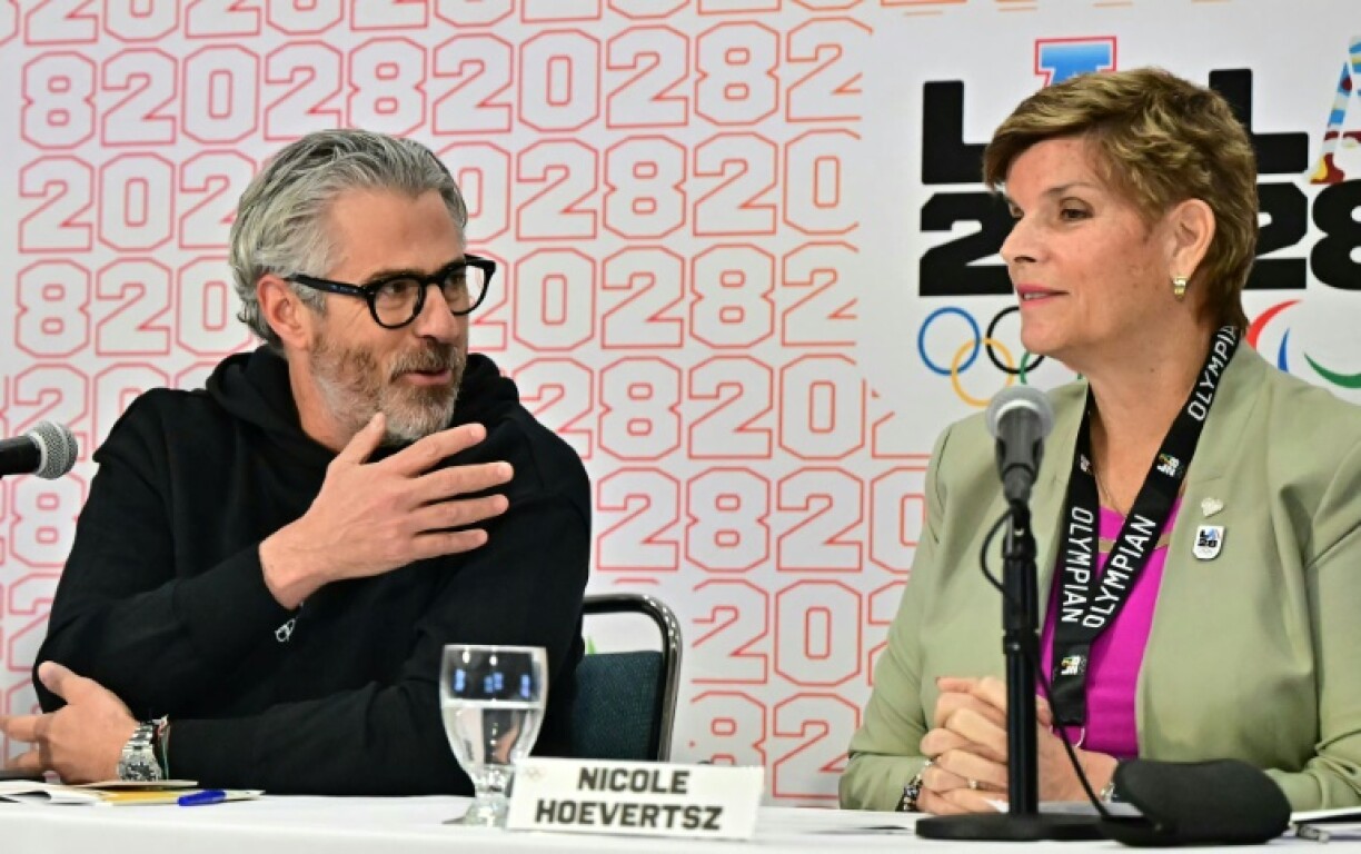 LA28 Chair President Casey Wasserman (L) and IOC Vice President and LA28 Coordination Commission Chair Nicole Hoevertsz say US President Donald Trump's travel ban will not affect the Olympics