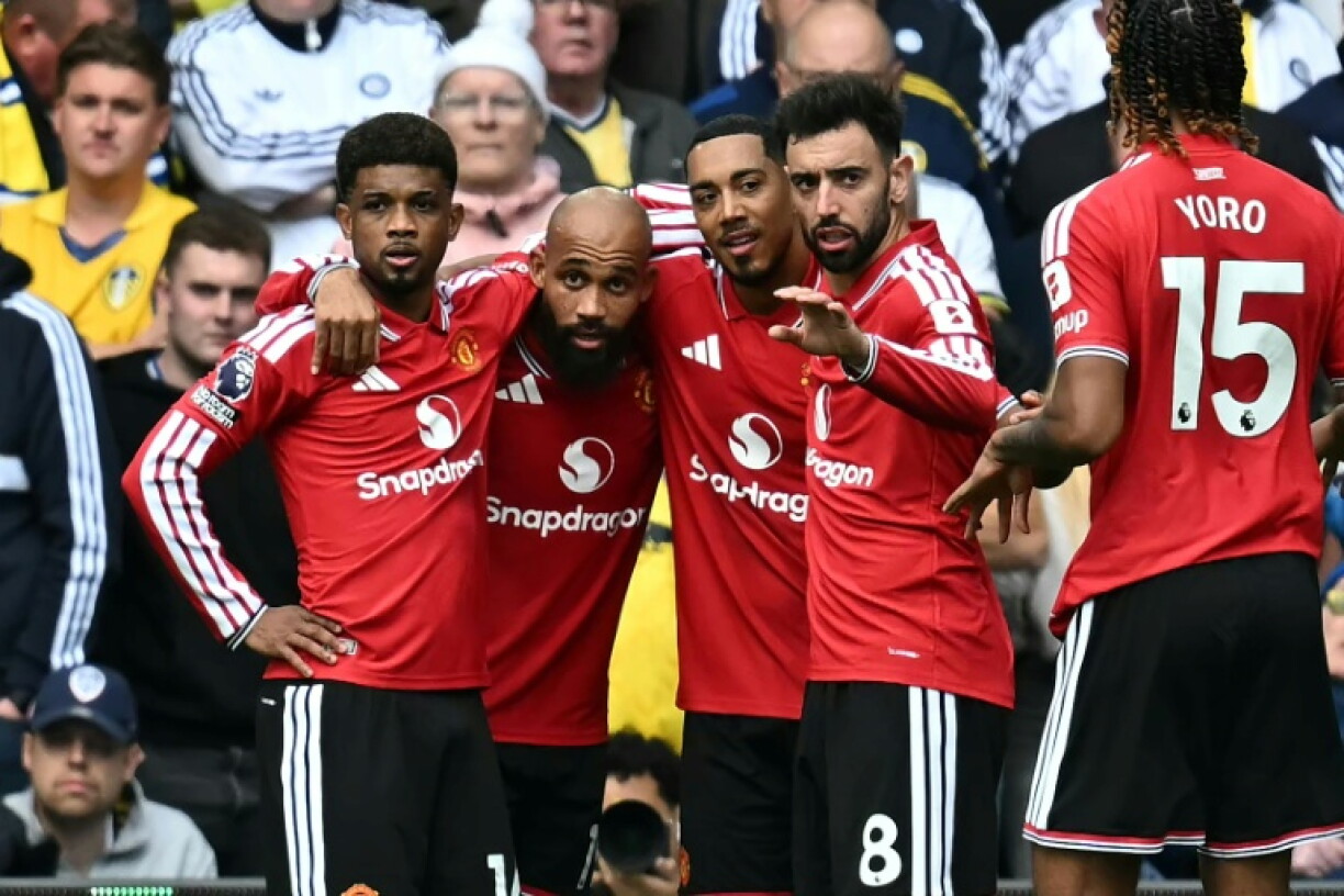 Manchester United forward Bryan Mbeumo (second left) celebrates scoring against Leeds at Elland Road