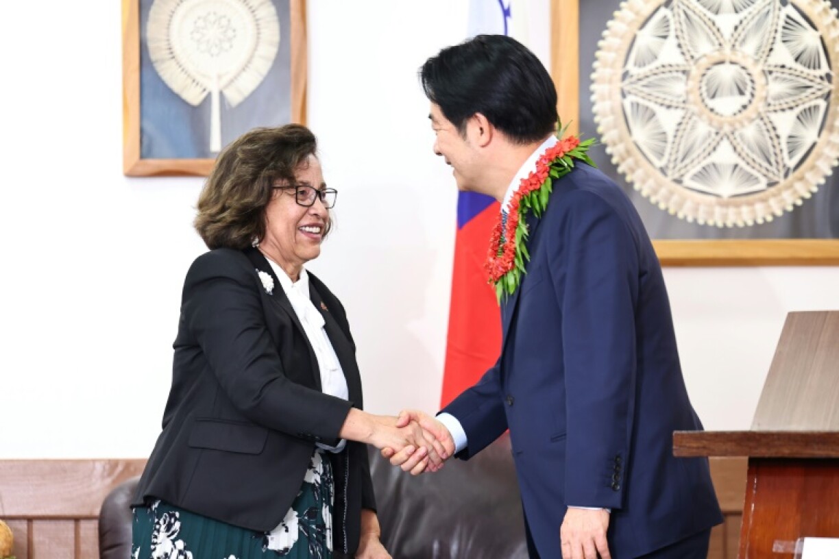 Marshall Islands President Hilda Heine (L) extended Lai a 'very warm welcome' after his arrival in the capital Majuro