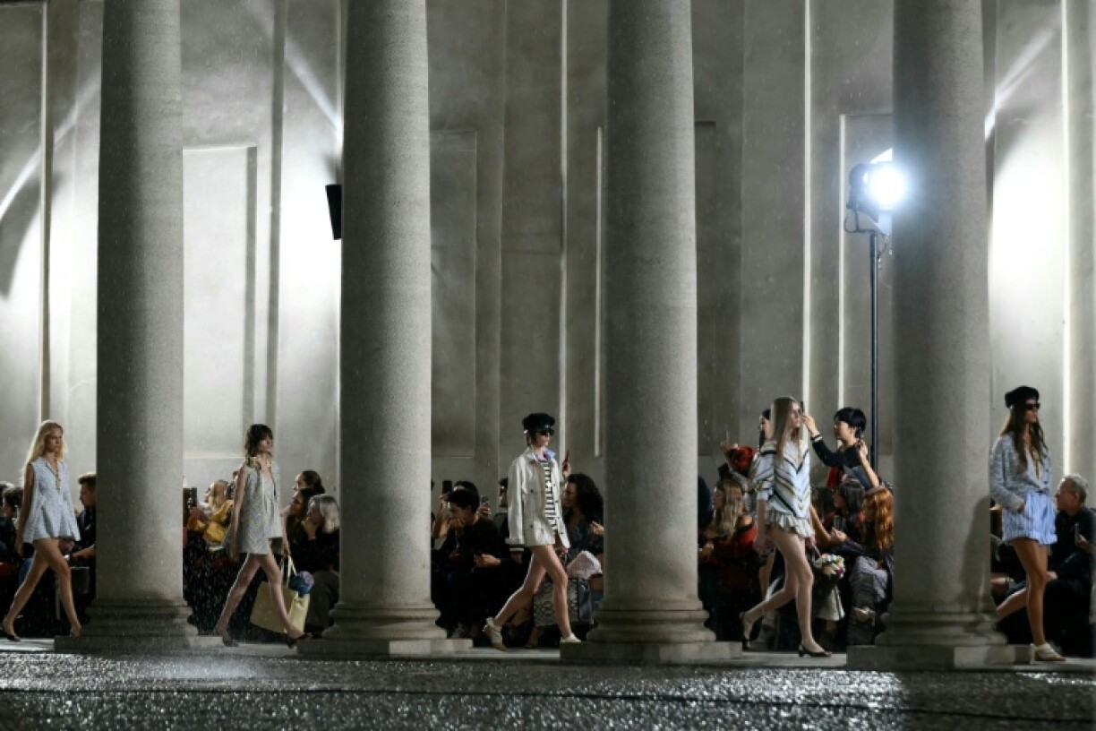 many models wore just swim briefs, shorts were rolled up and mini dresses became open-backed t-shirts.