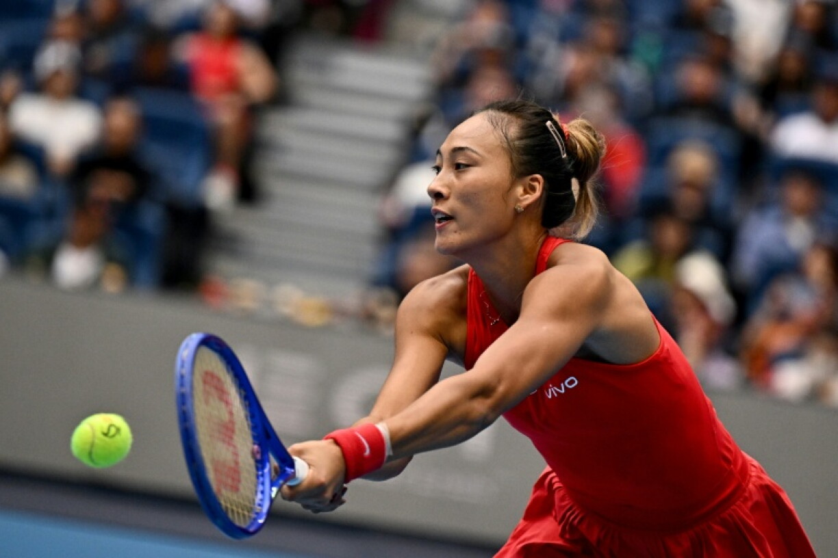 China's Zheng Qinwen hits a return to Ukraine's Elina Svitolina during their women's singles quarter-final at the China Open tennis tournament in Beijing on October 9, 2026.