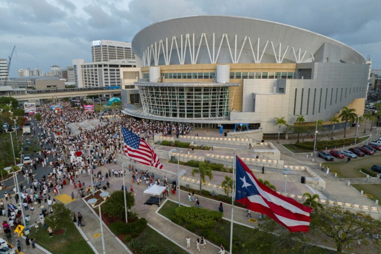 An aerial view shows people queing outside the Coliseo de Puerto Rico to attend the first night of Bad Bunny's highly anticipated residency in San Juan