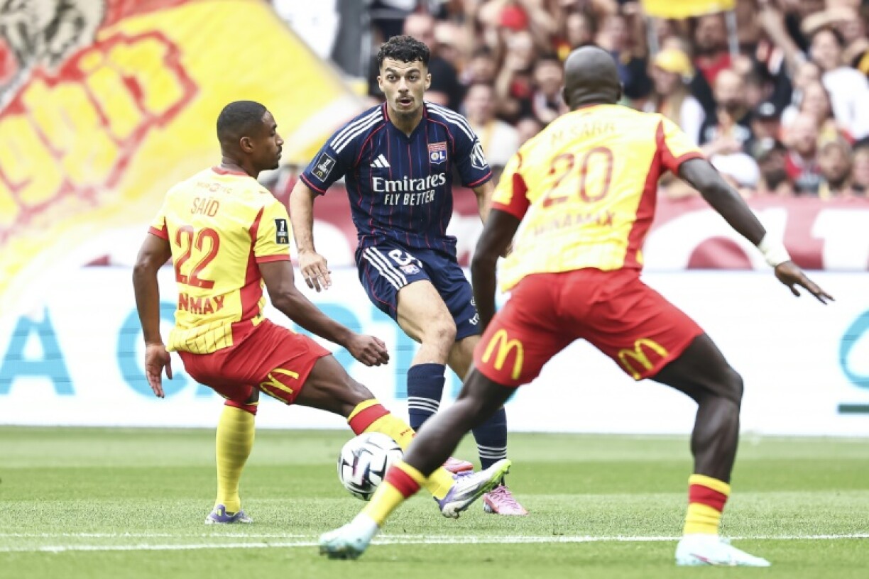 Georgian forward Georges Mikautadze (C) got Lyon off to a winning start at Lens