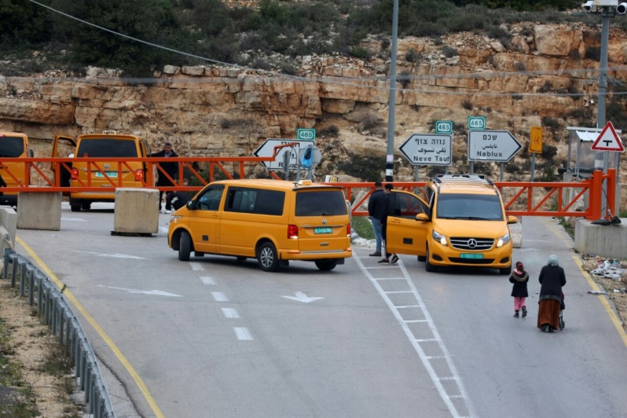 Orange metal gates are a stripped-down version of full checkpoints, which usually feature a gate and concrete shelters for soldiers