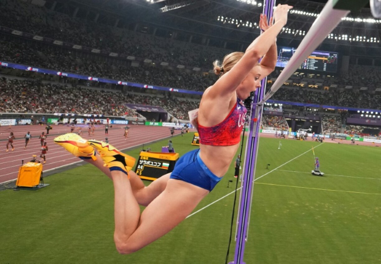 Katie Moon clears the bar on the way to a third consecutive pole vault gold at the world championships