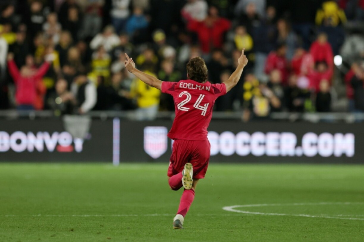 Daniel Edelman celebrates his winning penalty in St. Louis City's US Open Cup final victory over Columbus Crew