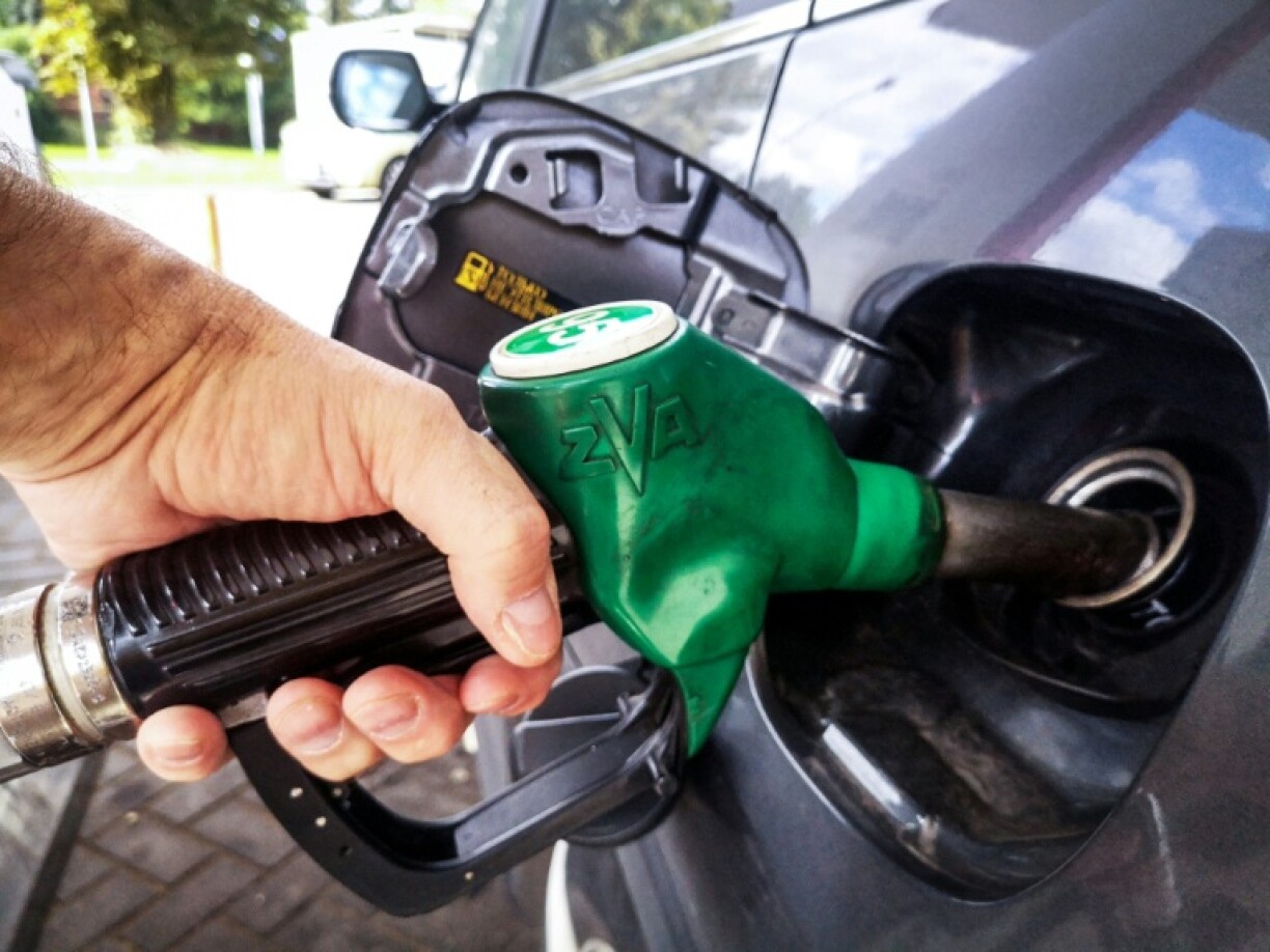 A man fills up his car at a gas station in Moscow on September 8, 2025