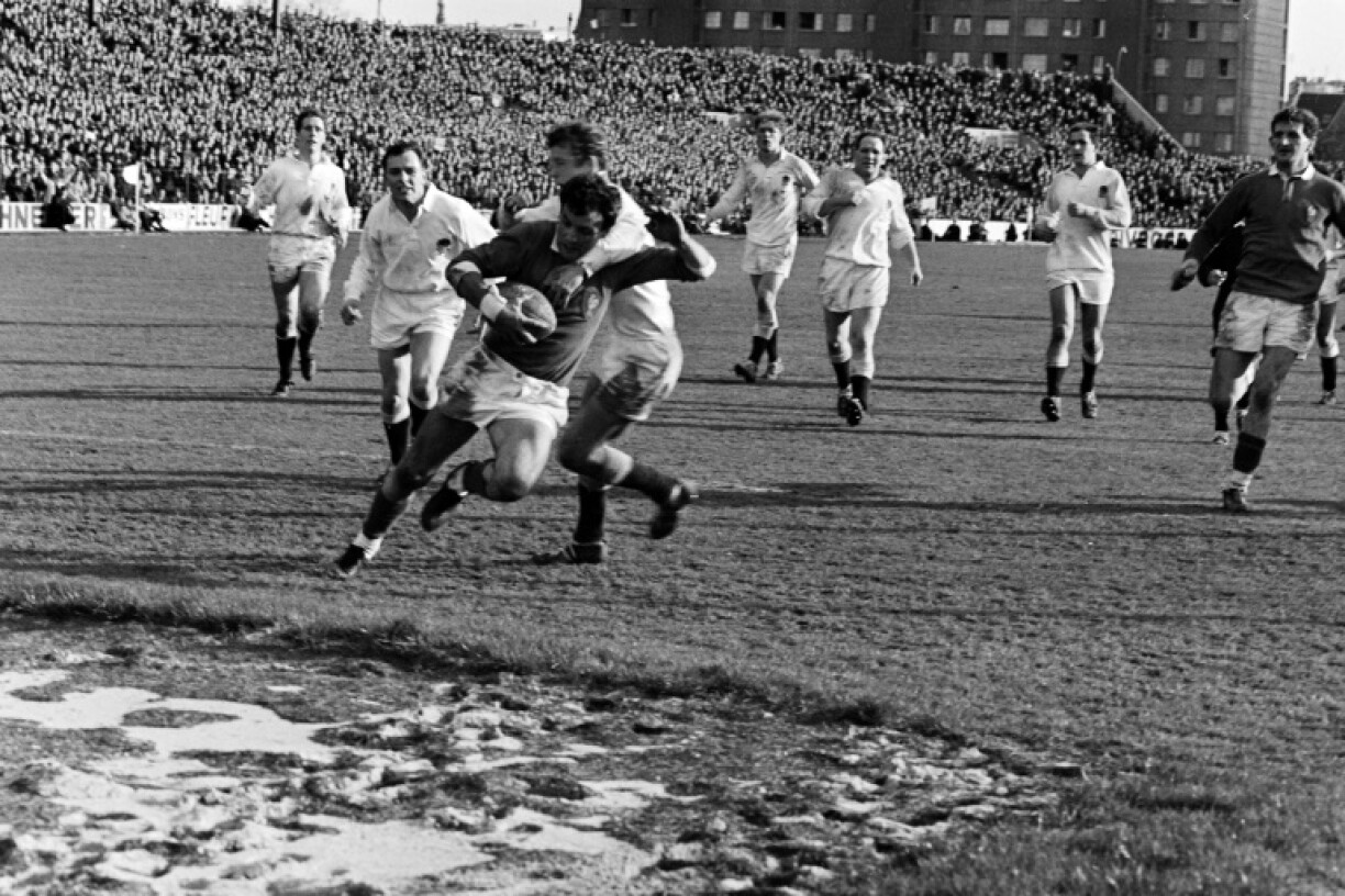 Andre Boniface, pictured scoring one of his 11 Test tries, was the epitome of French flair