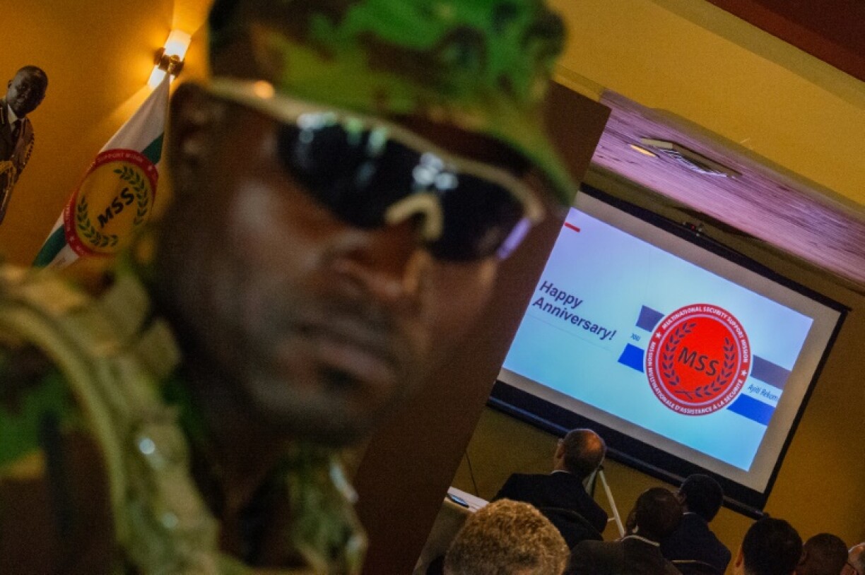 A Kenyan police officer looks on during an event marking the one year anniversary of the arrival of an international security force in Haiti in June 2025