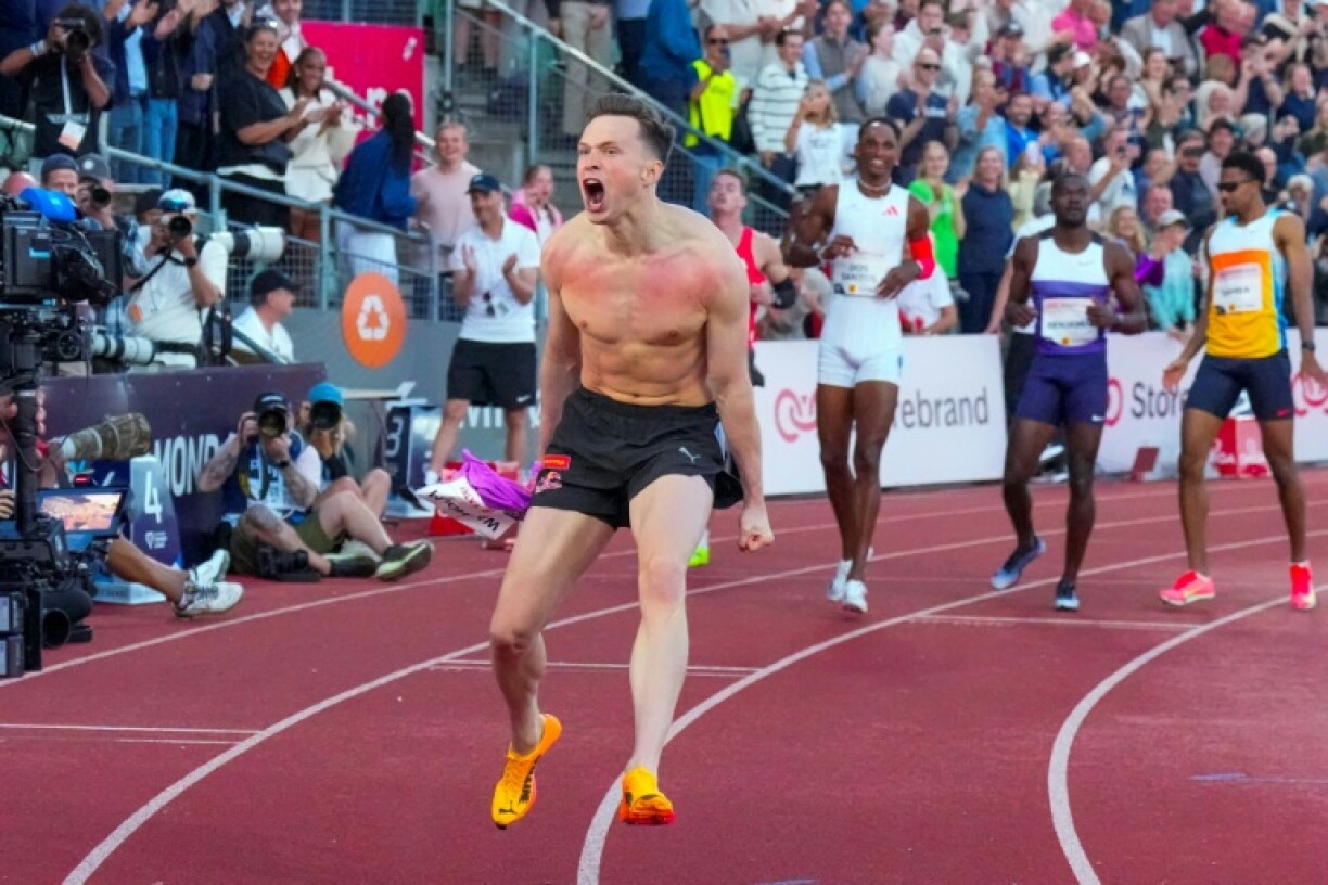 Norway's Karsten Warholm celebrates after winning in the men's 300m hurdles