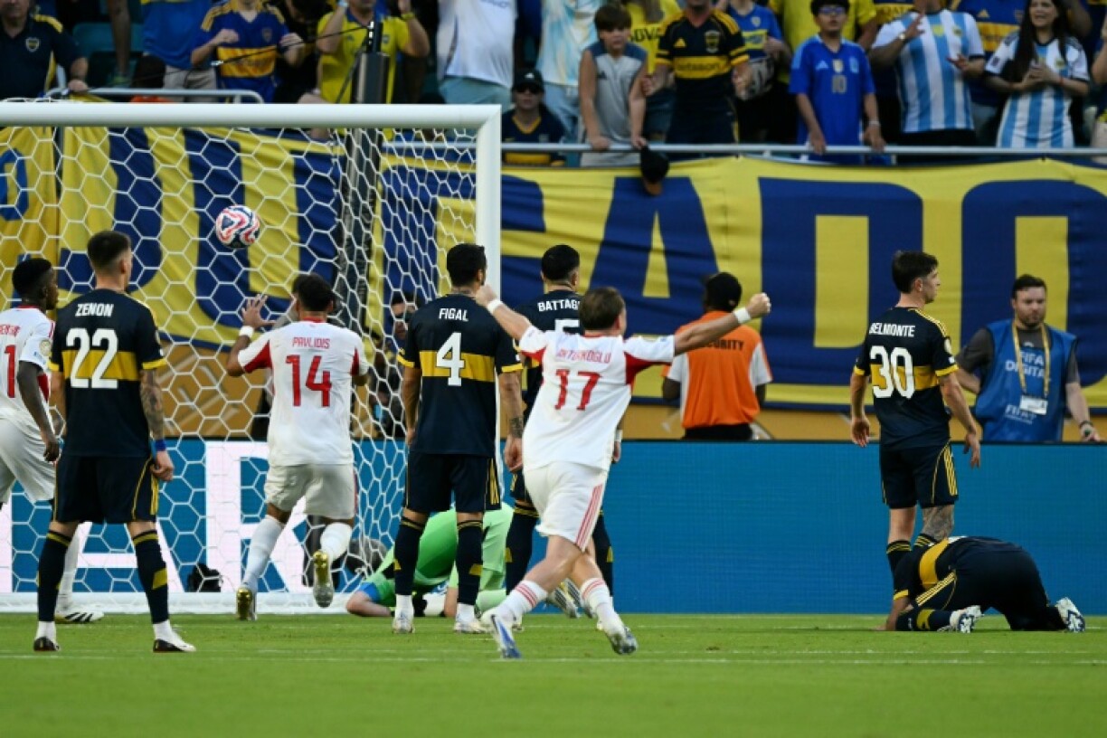 Benfica battled back to deny Boca Juniors in an entertaining encounter in Miami