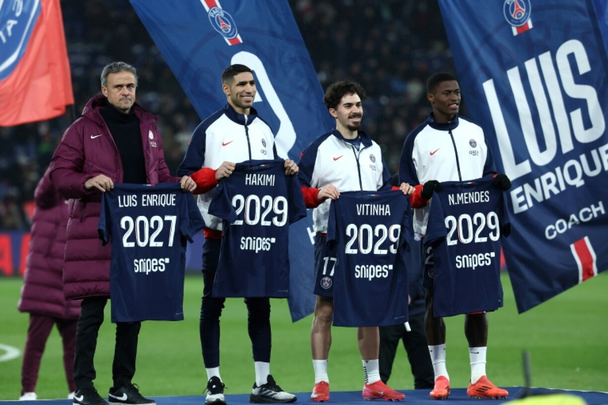 PSG coach Luis Enrique and stars Achraf Hakimi, Vitinha and Nuno Mendes were paraded to the crowd at the Parc des Princes on Friday after signing contract extensions with the club