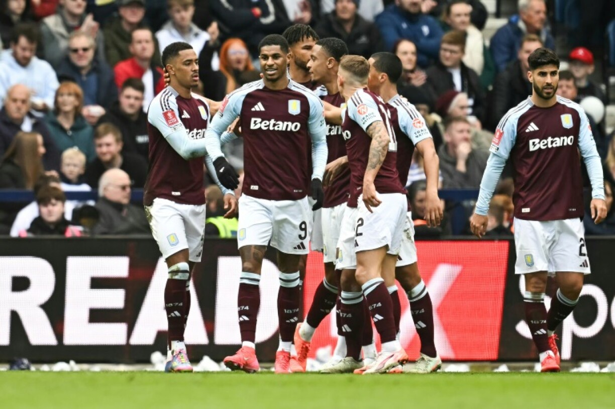 Aston Villa's Marcus Rashford celebrates after scoring against Preston