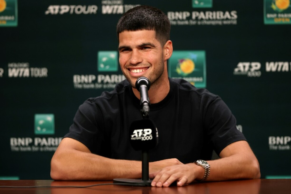 Spain's Carlos Alcaraz talks to reporters ahead of his ATP title defense at the BNP Paribas Open at Indian Wells