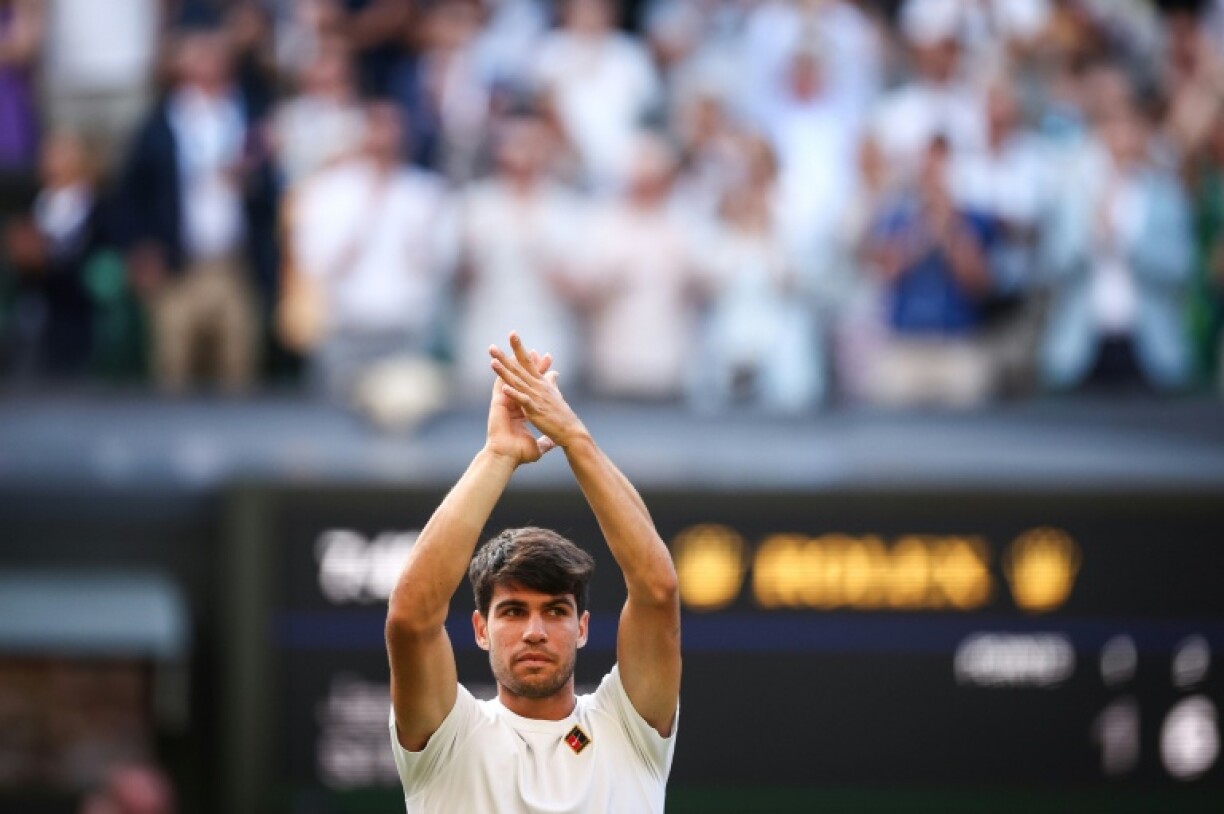 Spain's Carlos Alcaraz celebrates after his victory against Jan-Lennard Struff in the Wimbledon third round