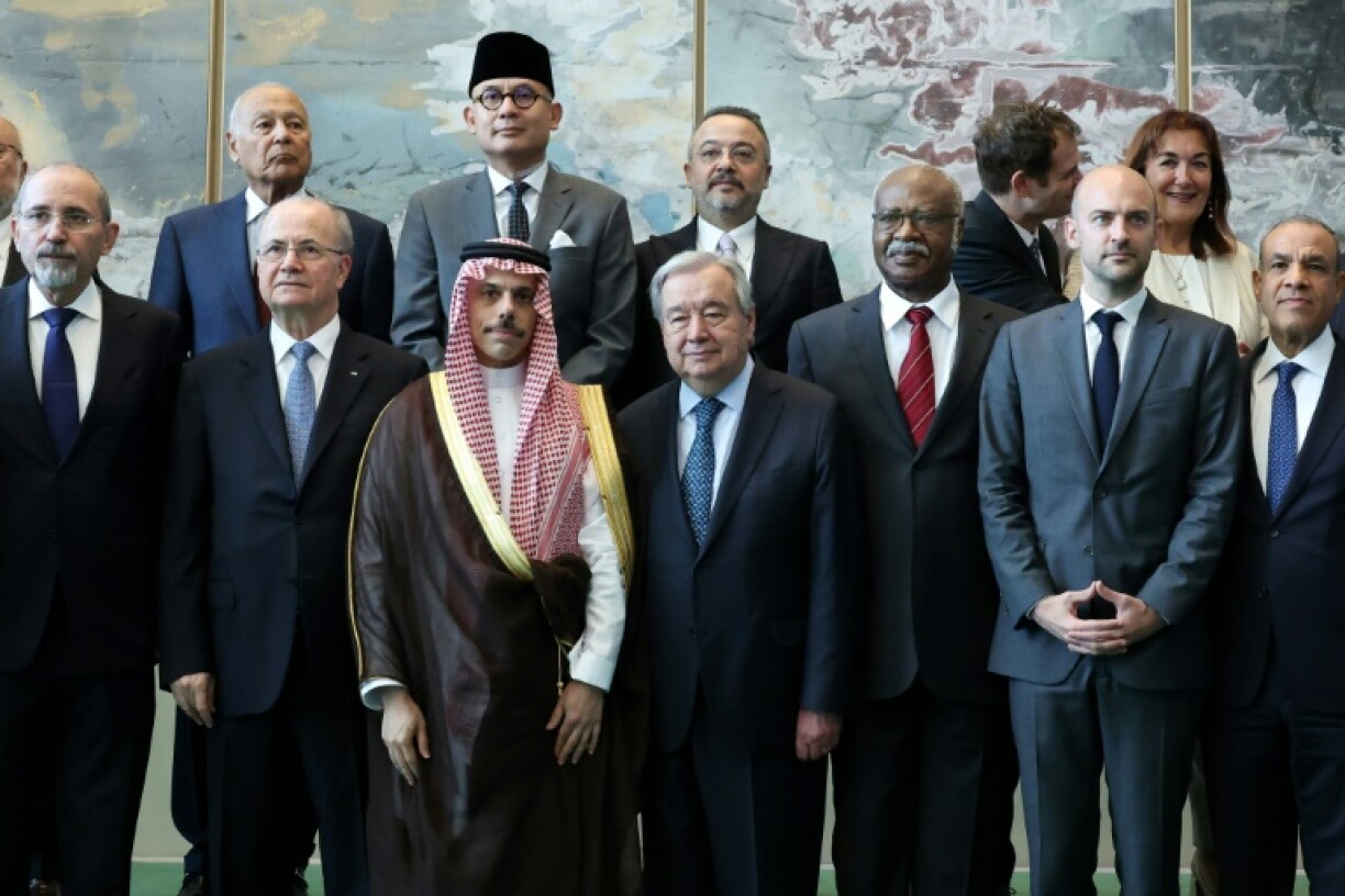 Palestinian prime minister Mohammad Mustafa (2L), French Foreign Minister Jean-Noel Barrot (2R) and others meet with UN Secretary-General Antonio Guterres (C) as they begin a conference on a two-state solution for Israel and the Palestinians