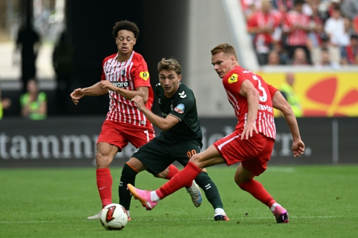 Freiburg's Derry Scherhant (L) was called up to the Germany squad for the first time this season