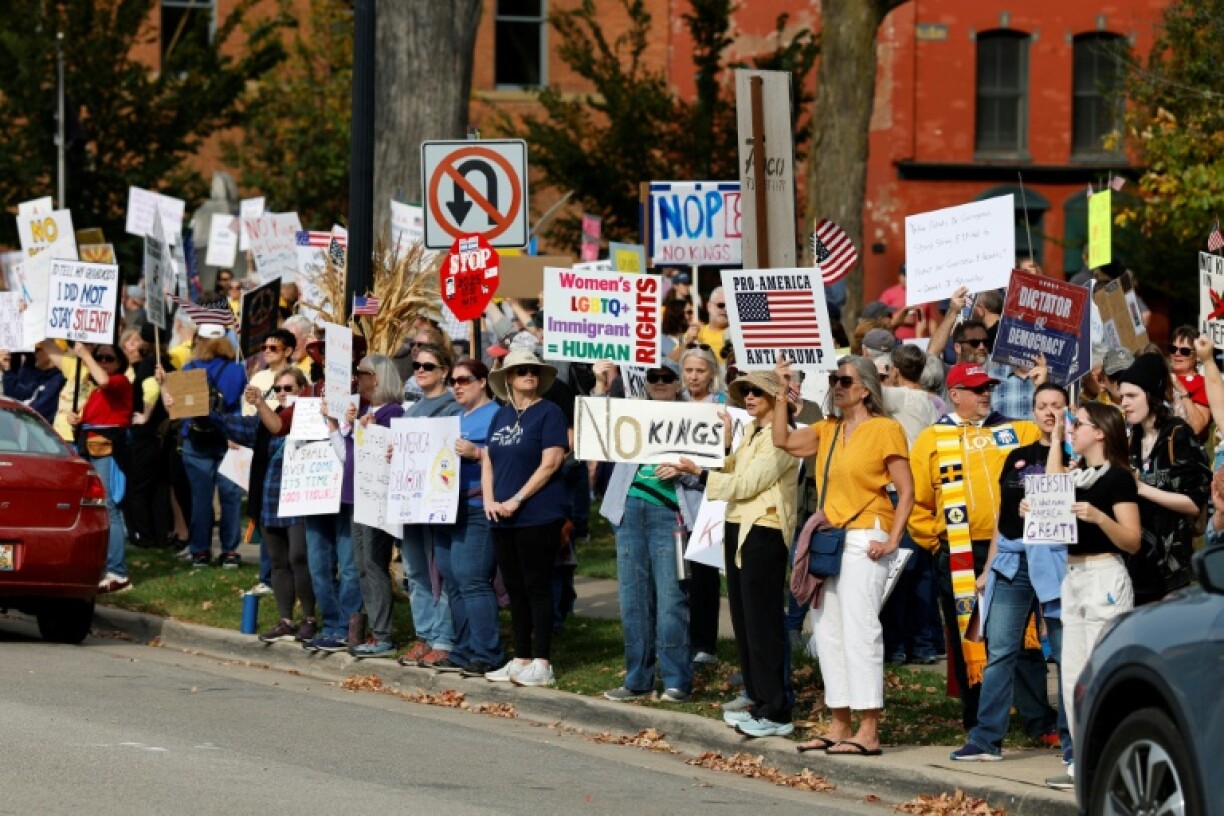 People participate in a 'No Kings' national day of protest in Howell, Michigan
